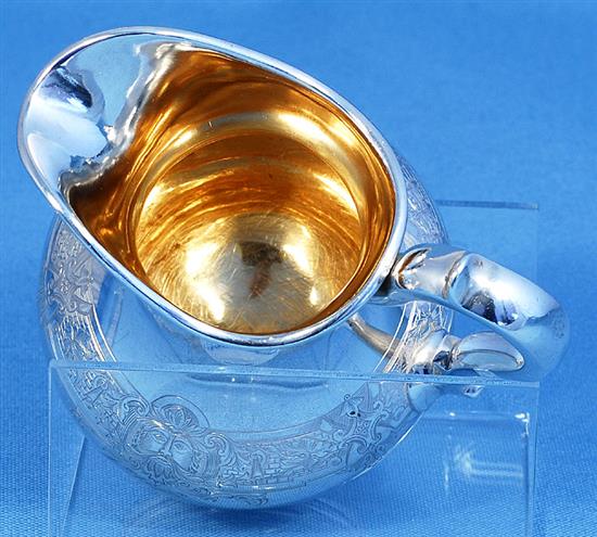 A Victorian silver cream jug, by Hunt & Roskell, (Alfred Benson & Henry Hugh Webb), Height: 143mm Weight: 8.2oz/256grms